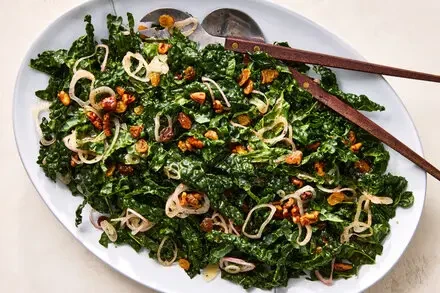 Kale Salad with Pickled Raisin Vinaigrette & Toasted Walnuts